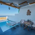 Salida Del Sol Santorini Lägenhetshotell Éxo Goniá