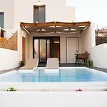 Salida Del Sol Santorini Lägenhetshotell Éxo Goniá
